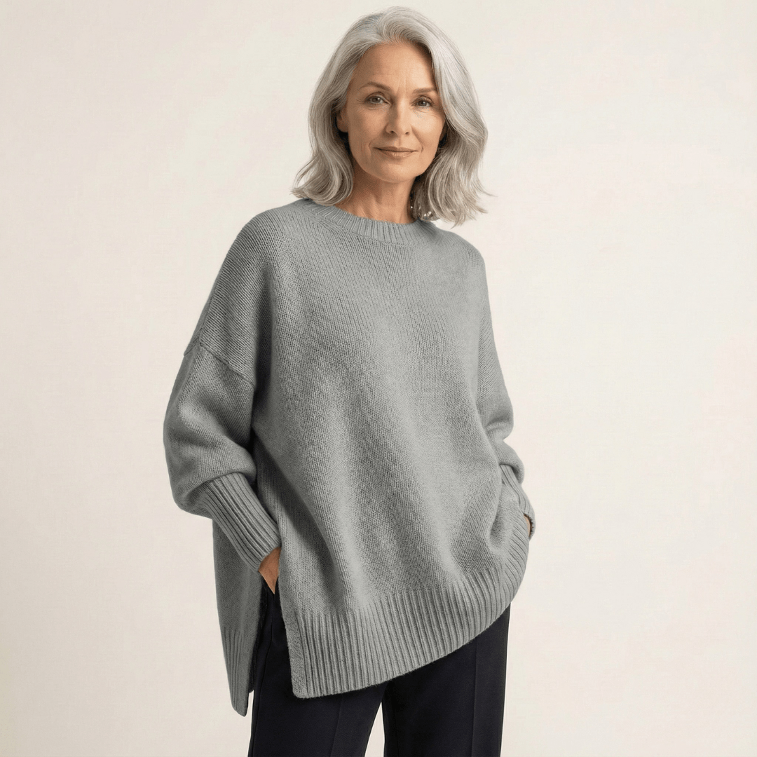 Livia I Maglione elegante con fondo asimmetrico
